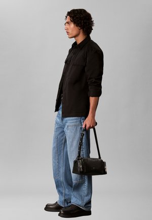 Calvin Klein, JEANS FLIGHT - Taška cez plece - black