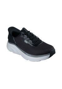 Scarpa atletica nera con parte superiore in mesh traspirante, chiusura con lacci e suola intermedia spessa bianca con marchio "Vapor Foam".