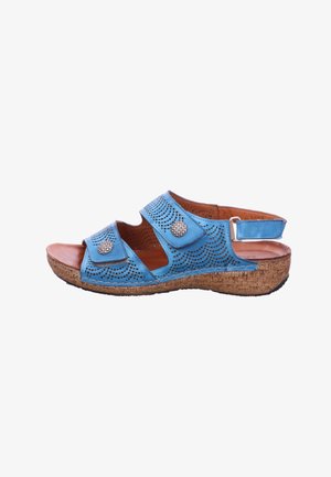 Blaue Ledersandale mit Korkkeilsohle, perforiertem Design, zwei verstellbaren Riemen mit dekorativen Knöpfen, offenem Zehen- und Fersenbereich.