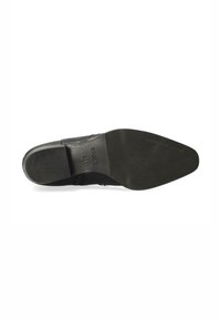 Suela negra puntiaguda de un zapato de vestir de cuero con "SHABBIES" y la talla "37" grabadas en la parte inferior.