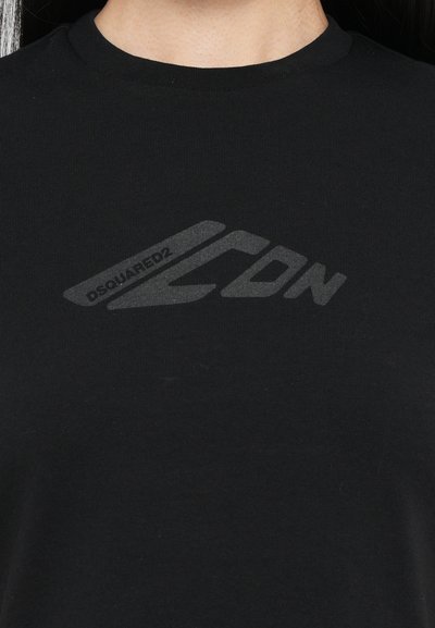 Black cotton T-shirt with a ribbed crew neck and a gray logo design featuring "DSQUARED2 CDN" centered on the chest.