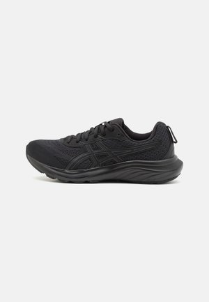 Black athletic shoes made from mesh and synthetic materials, featuring a textured upper, lace-up design, and a cushioned sole with a pull tab.