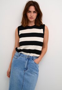 Sleeveless top with black and white horizontal stripes, paired with a high-waisted light blue denim skirt featuring pockets and a button closure.