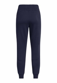 Marineblaue Jogginghose aus weichem Stoff, mit einem elastischen Bund, schmal zulaufenden Beinen und Kniepaneelen für zusätzliche Textur.