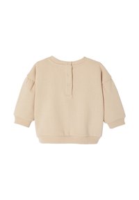 Beige Sweatshirt mit rundem Halsausschnitt, drei Knöpfen am Rücken, überschnittenen Schultern sowie Rippbündchen und Saum. Weicher, strukturierter Stoff.