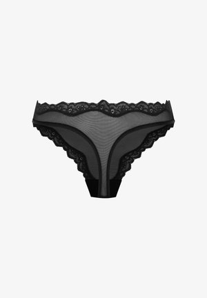 Black lace thong featuring a sheer mesh body, scalloped edges, and a solid band at the back, offering a delicate design and textured detail.