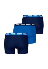 Muške bokserice u tamnoplavoj, tamnoplavi i svjetloplavoj boji, izrađene od mekog materijala s teksturiranim pojasom koji sadrži Puma logo.