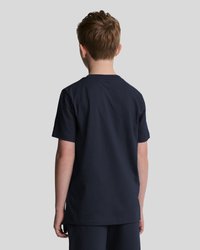 T-shirt en coton bleu marine à manches courtes et col rond. Design simple, couleur unie et coupe décontractée sans aucune marque visible.