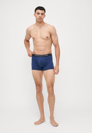 Muške bokserice u tamnoplavoj boji s crnim pojasom na kojem je bijeli natpis "POLO RALPH LAUREN". Izrađene od mekanog, rastezljivog materijala.