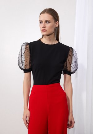 T-shirt med print - black