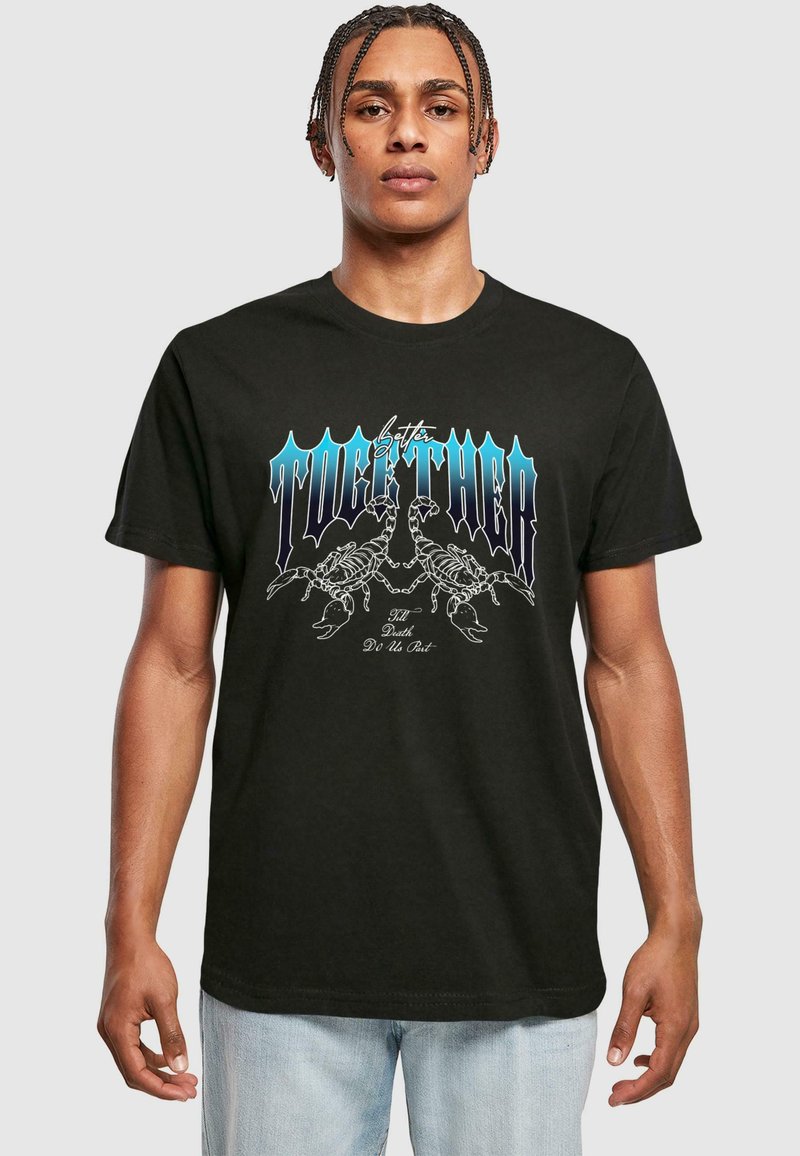 Black cotton t-shirt featuring a graphic design of scorpions and text in blue and white. Regular fit with short sleeves and a round neck.