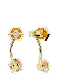 Pendientes hexagonales de oro con un diseño curvado, acentos de cristal transparente y una textura brillante, con una piedra central prominente en cada uno.