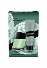 Setti sisältää vihreän Eau de Toilette -pullon (30 ml) ja harmaan suihkugeelituubin (50 ml). Pakkaus on koristeltu geometrisilla kuvioilla ja näyttävällä tekstillä.