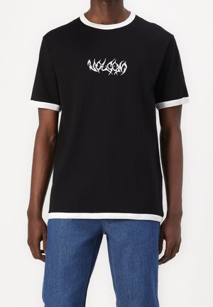 Black short-sleeve t-shirt with white ringer collar and cuffs. Features stylized graphic text in white on the front.