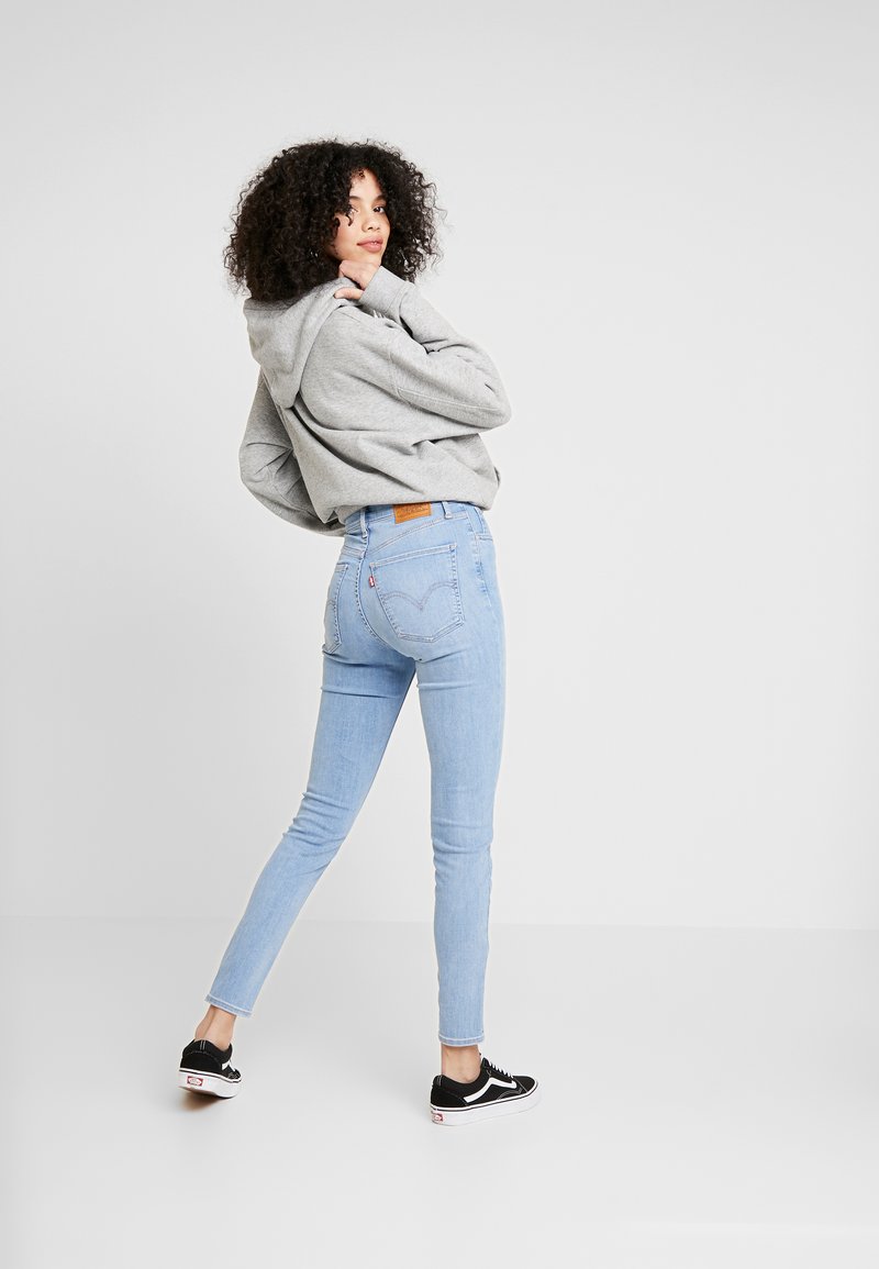 Levi's® MILE HIGH SUPER SKINNY - Jeans Skinny Fit - between space and  time/light-blue denim 