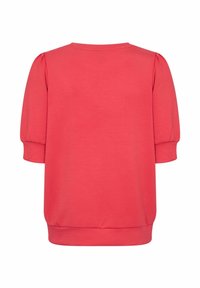 Koralli pullover-paita lyhyillä puff-hihoilla, pyöreällä kaula-aukolla ja ribatulla helman. Valmistettu pehmeästä kankaasta, jossa on sileä rakenne.
