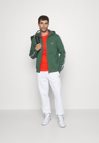 Lacoste Sport CLASSIC - Treningo apatinė dalis - white