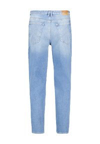 Light blue denim jeans with a tapered leg, featuring two back pockets and a leather patch on the waistband. Smooth texture and faded finish.