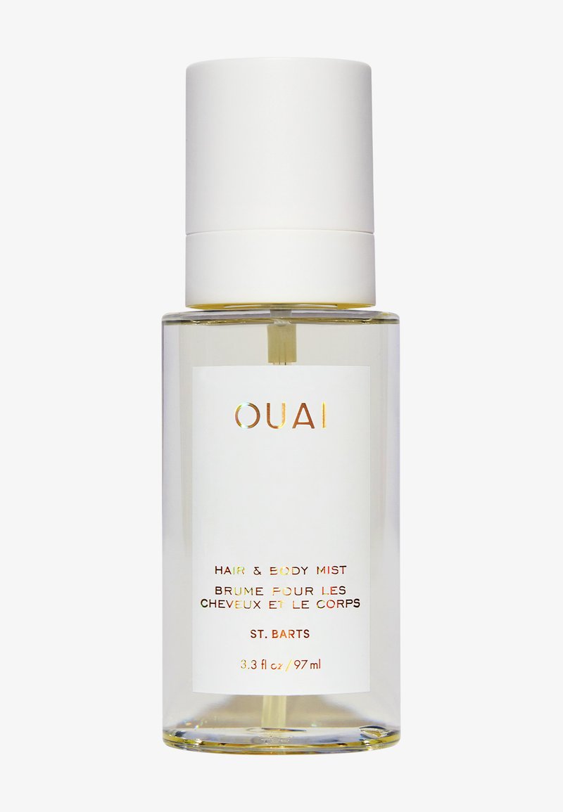 Botella de spray de vidrio transparente de Ouai Hair and Body Mist, aroma St. Barts, 97 ml, con etiqueta blanca y tapa.