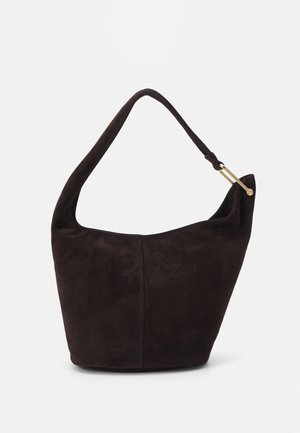 Dark brown suede hobo bag with a curved, wide strap and a smooth texture. Features a minimalist design and a subtle seam detail.