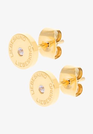 Orecchini a perno color oro con design circolare. Incisi con "LIEBESKIND" e gemma trasparente al centro. Superficie liscia, hardware minimalista.