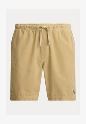 Bieži valkājami bēša korduroja šorti ar elastīgu jostu un auklu, ar mazu tumšu izšūtu logotipu pie apakšmalas kreisajā kājā.