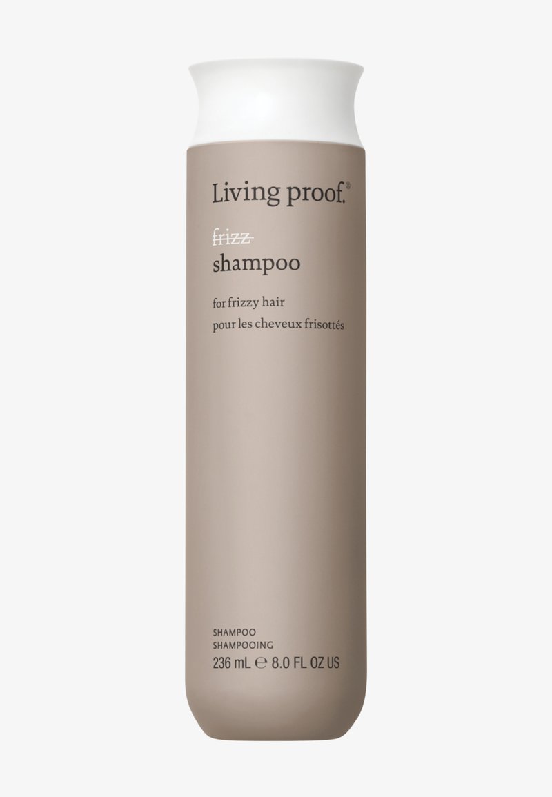 Living Proof shampoo bottle labeled for frizzy hair, beige with white cap, 236 mL (8 fl oz), English and French text.
