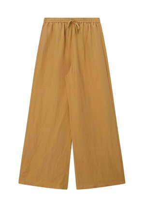 Wijde, lichtbruine broek met elastische tailleband en trekkoord, gemaakt van lichtgewicht stof.