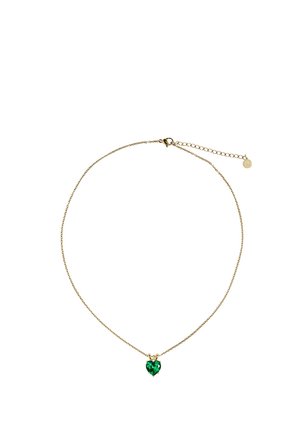 Collier délicat en chaîne d'or avec un petit pendentif en pierre précieuse verte en forme de cœur et fermoir réglable avec chaîne d'extension.