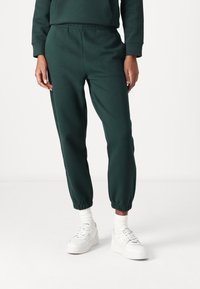 Lacoste Tepláky - sinople