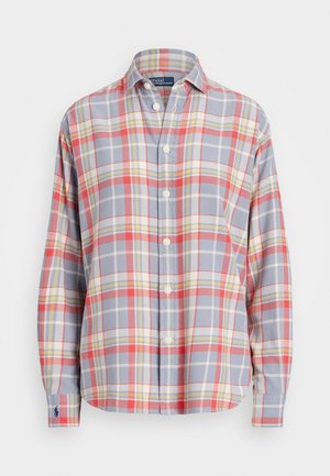 Langærmet skjorte med knapper og krave, med et ternet mønster i grå, rød, gul og hvid, med en lille logo på manchet.