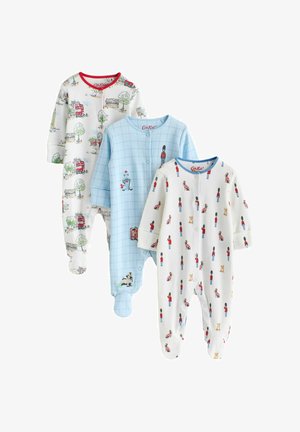 Tre pigiami con piedini per neonati con stampe a tema Londra: autobus rossi a due piani, guardie reali e monumenti in colori tenui.