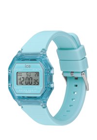 Montre numérique avec un boîtier en plastique turquoise transparent, un bracelet en silicone bleu clair, un écran LCD et des boutons pour les fonctions de minuterie et d'éclairage. Résistante à l'eau jusqu'à 30 m.