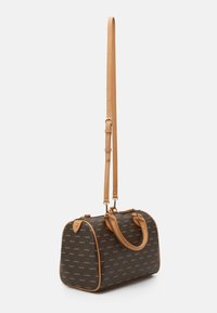 Brown textured handbag with tan accents, featuring two handles and an adjustable shoulder strap. Displaying a repeating logo pattern.