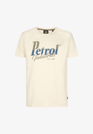 Cream cotton t-shirt featuring a large blue and grey "Petrol Industries" graphic with year established 1989, short sleeves, and crew neck.