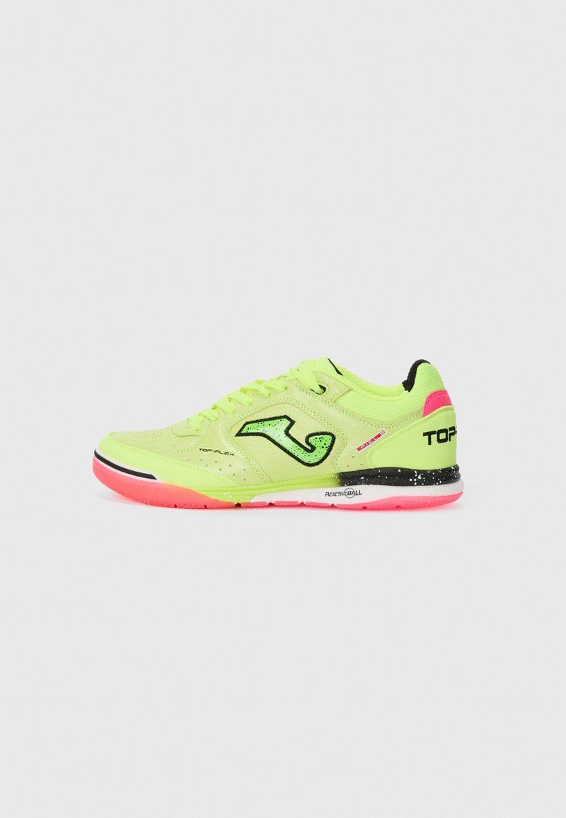 Neon green athletic shoe with black accents and speckled pink sole. Features lace-up design and reinforced heel. Lightweight synthetic material.