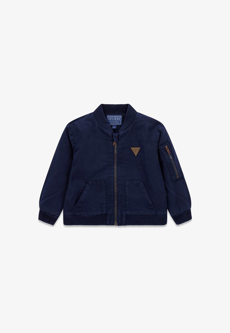 Navy bomber jacket with a zip front, two front pockets, and a side pocket. Features ribbed cuffs and collar. Includes a triangle logo detail.