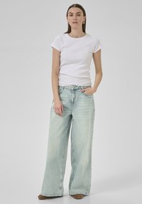 My Essential Wardrobe JESSIE - CROTCH X-WIDE - Laza szabású farmerek - light blue dirty wash