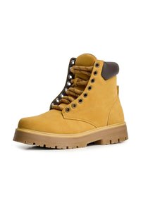 Beige Wildleder-Stiefelette mit braunen Lederelementen, Metallösen, gepolstertem Kragen und strukturiertem Gummisohle. Verfügt über ein verstärktes Schnürsystem.