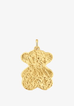 Pendentif en or en forme d'ours texturée et organique avec une boucle pour l'attacher. Présente une surface inégale et des bords lisses.