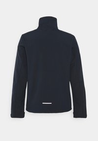 Navy blue jacket with a high collar, long sleeves, and a white reflective stripe at the back hem. Smooth fabric texture, minimalist design.
