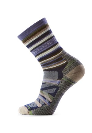 Multicolor mid-calf sock with horizontal stripes in purple, brown, green, white, and geometric patterns on foot and heel sections.