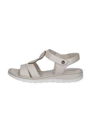 Lichtbeige leren sandalen met drie brede banden, een cirkelvormig accent aan de voorkant en een witte rubberen zool. Geperforeerde binnenzool voor ventilatie.