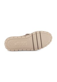 Beige shoe sole with textured grip, deep grooves, and "Gabor" logo embossed in the center, displayed against a white background.