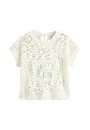 Bílý krátký pletený top s krátkými rukávy, vzorem s průstřihy, žebrovanými okraji, kulatým výstřihem a malým zavazováním na zadní straně.