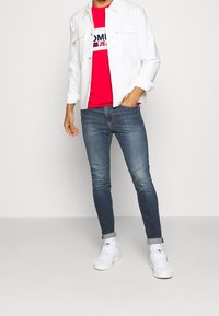 Tommy Jeans Vaqueros pitillo - dark-blue denim