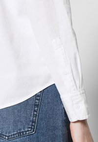 Levi's® CLASSIC SHIRT - Overhemdblouse - bright white