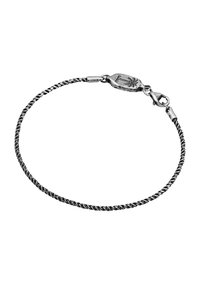 Silver twisted bracelet featuring a lobster clasp and an oval tag with an engraved design; smooth texture with a polished finish.