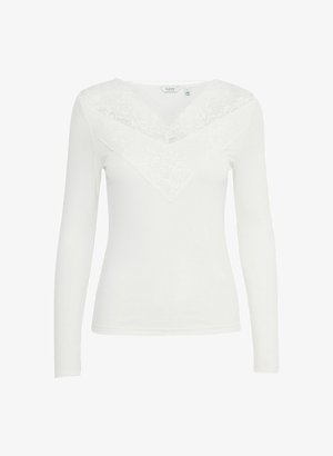 Witte lange mouwen top met een kanten V-hals ontwerp, zachte stof, aansluitende pasvorm en gladde textuur. Kantdetails op de schouderstukken en schouders.