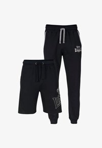 Pantalones deportivos negros de Lonsdale con cordón gris y pantalones cortos negros a juego con cordón, ambos con estampados del logo en la pierna y la cadera.